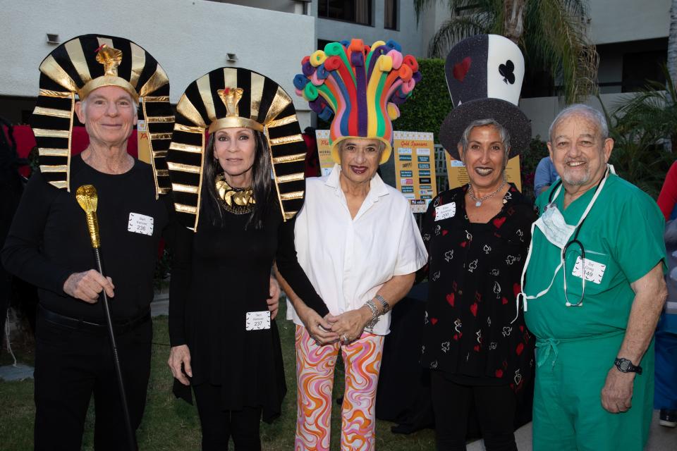 Bart Ketover, Terri Ketover, Bianca de Vries, Ellen Goodman and Sid Craig show off their costumes at the Boys & Girls Club of Palm Springs' "Be a Hero for Kids Halloween Bash" on Oct. 1, 2022.