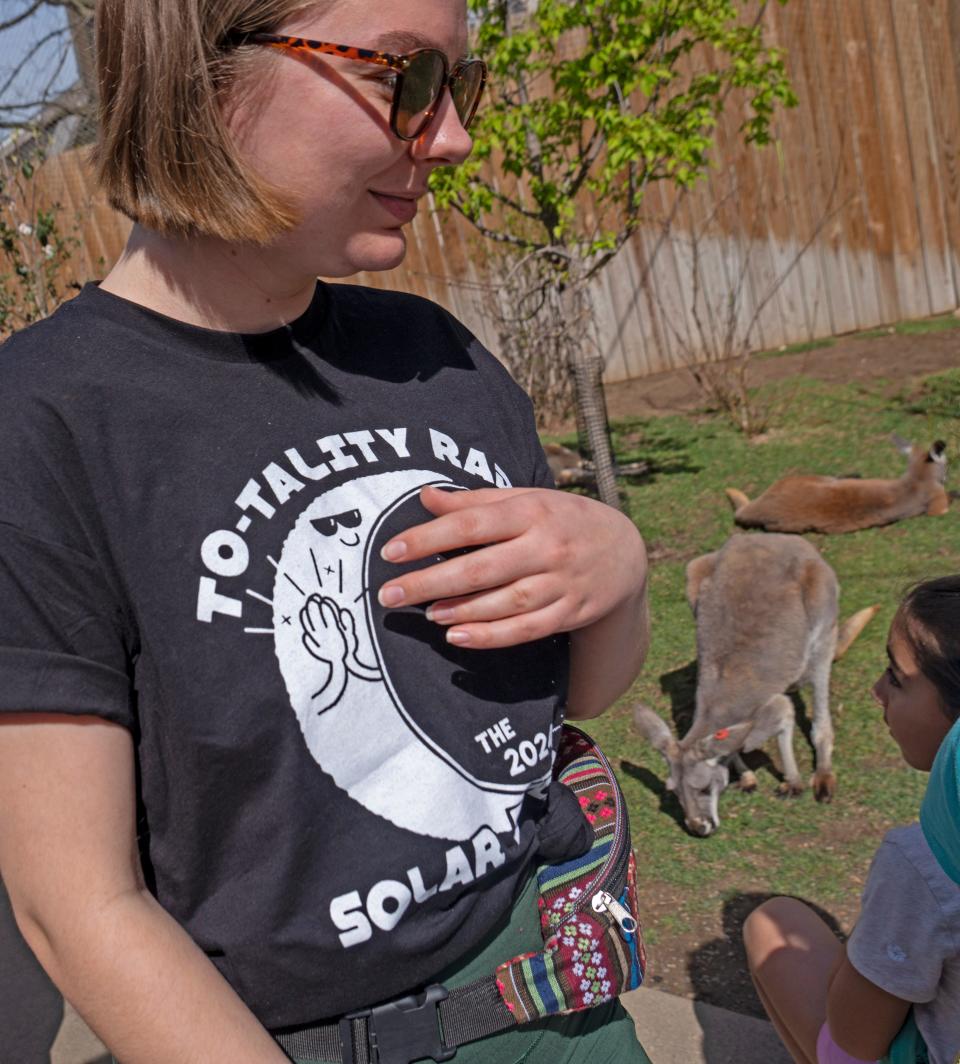 Autumn Rettke, from Green Bay, visits the kangaroos Monday, April 8, 2024, at the Indianapolis Zoo, before the eclipse. Indianapolis is in the path of totality of the eclipse.