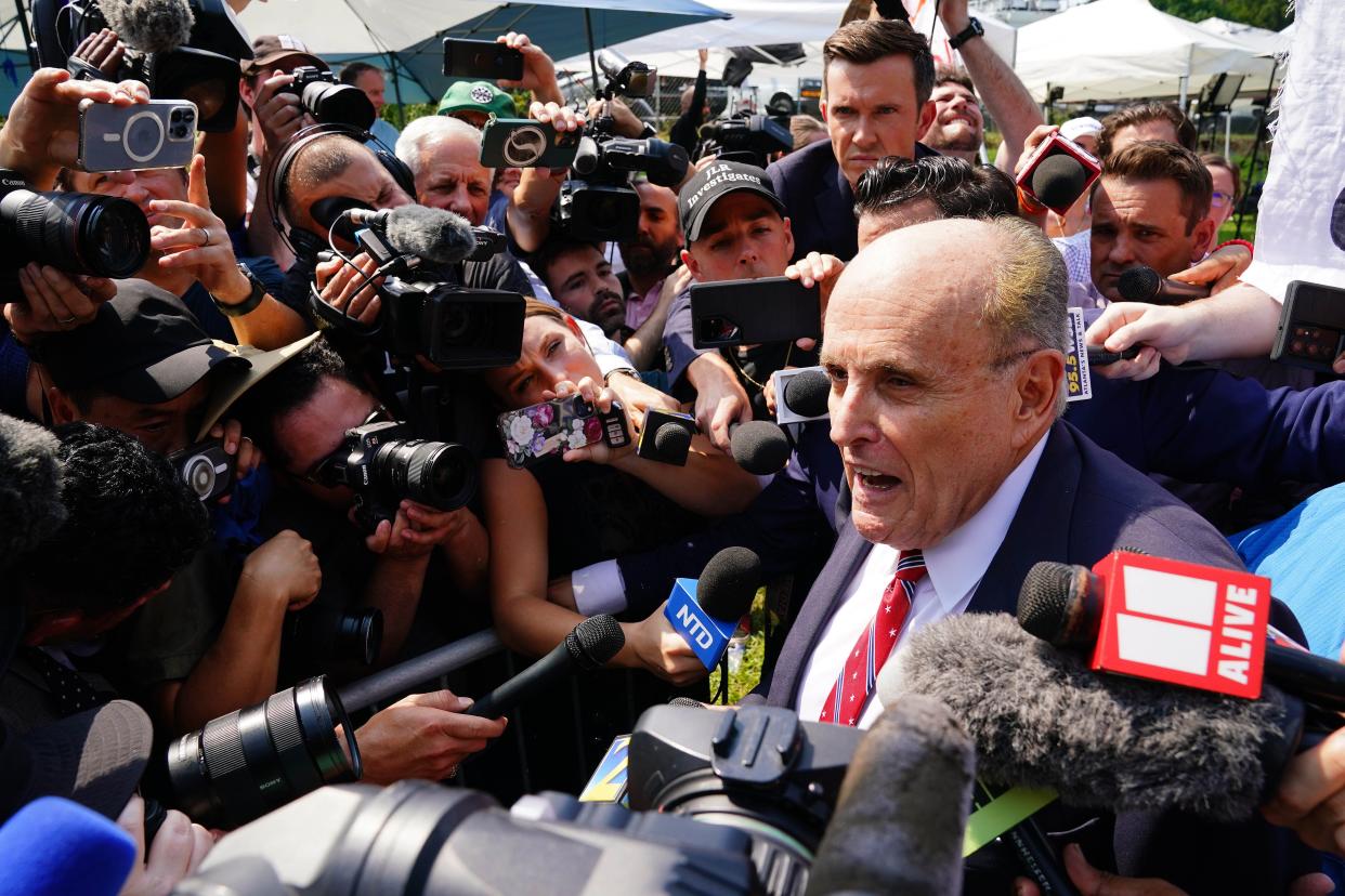 Aug 23, 2023; Atlanta, GA, USA; Former Trump attorney Rudy Giuliani speaks with the media after being processed at the Fulton County Jail. A grand jury in Fulton County, Georgia indicted Donald Trump. The indictment includes 41 charges against 19 defendants, from the former president to his former attorney Rudy Guiliani and former White House Chief of Staff Mark Meadows. The legal case centers on the state’s RICO statute, the Racketeer Influenced and Corrupt Organizations Act.