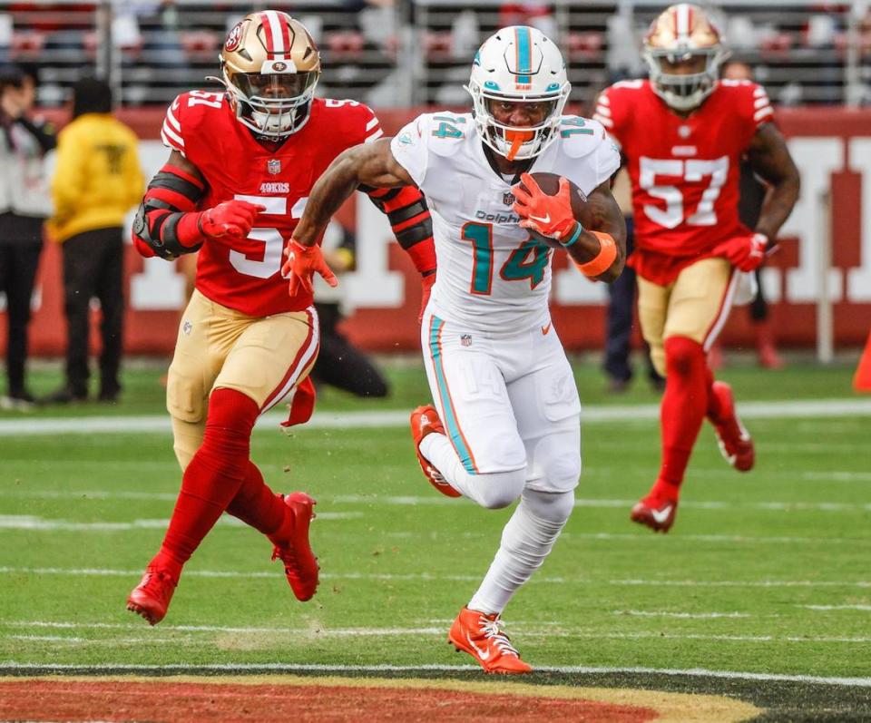 Miami Dolphins wide receiver Trent Sherfield (14) scores on a 75 yard reception in the first quarter against the San Francisco 49ers at Levi’s Stadium in Santa Clara, California on Sunday, December 4, 2022.