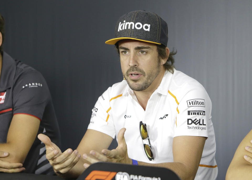 McLaren driver Fernando Alonso of Spain speaks during a news conference at the Paul Ricard racetrack, in Le Castellet, southern France, Thursday, June 21, 2018. The Formula one race will be held on Sunday. (AP Photo/Claude Paris)