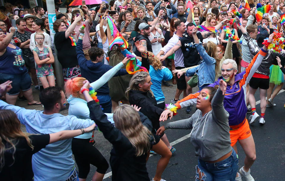 A 'flash mob' performs at a street party in Melbourne. (Photo: Scott Barbour via Getty Images)