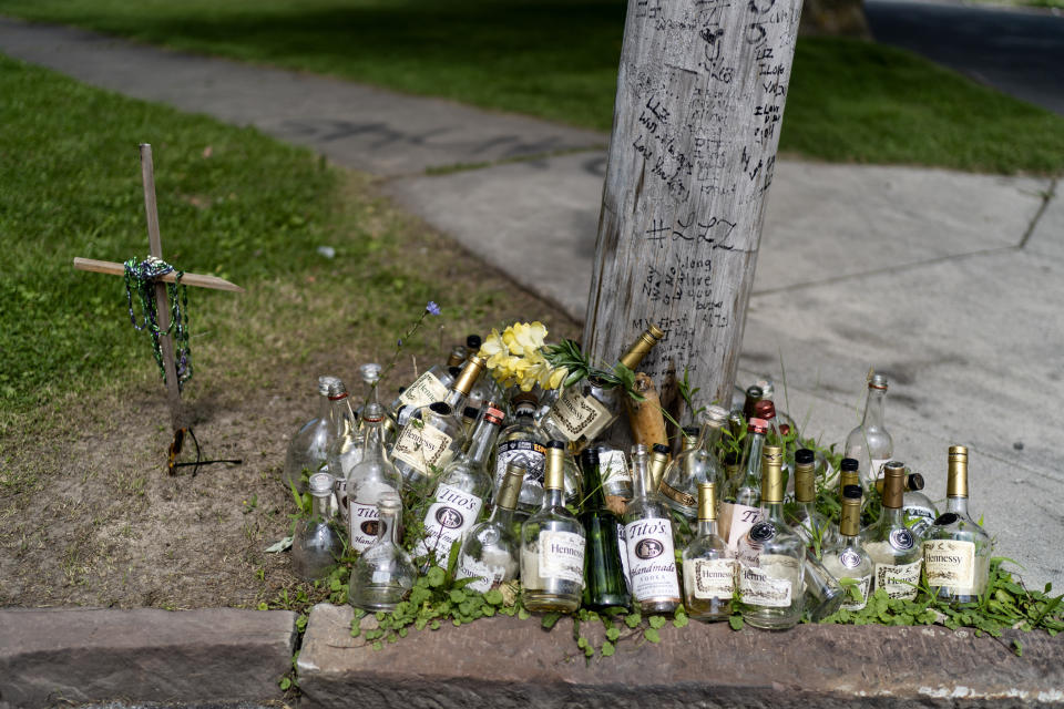A makeshift memorial marks the scene of a fatal stabbing in the park across the street from Trinity Baptist Church Sunday, Aug. 20, 2023, in Niagara Falls, N.Y. (AP Photo/David Goldman)
