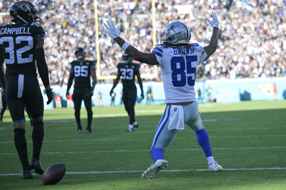 Dallas Cowboys wide receiver Noah Brown (85) celebrates after scoring a touchdown during the second half of an NFL football game against the Jacksonville Jaguars, Sunday, Dec. 18, 2022, in Jacksonville, Fla. (AP Photo/Phelan M. Ebenhack)