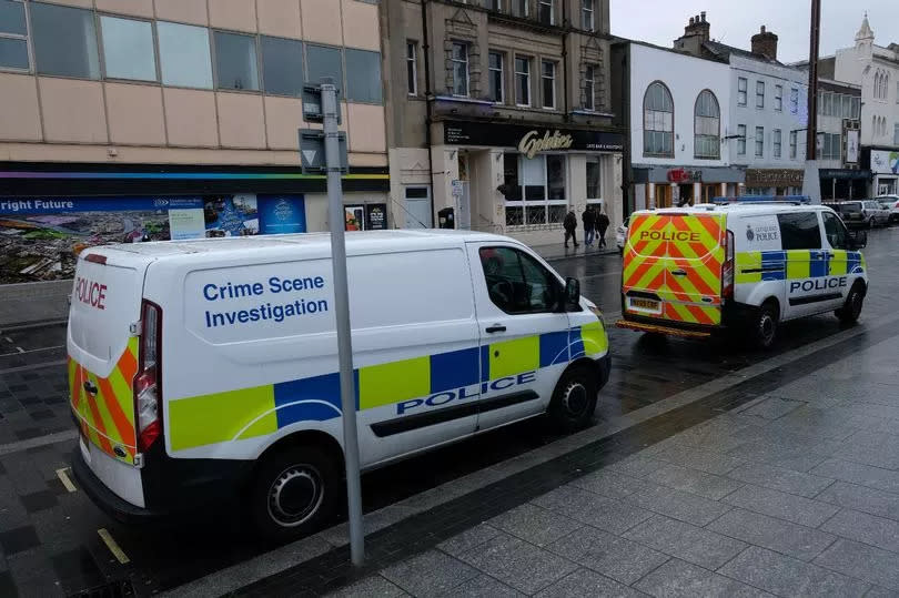 Police and CSI units outside Goldies Bar in Stockton High Street -Credit:Ian Cooper / Teesside Live