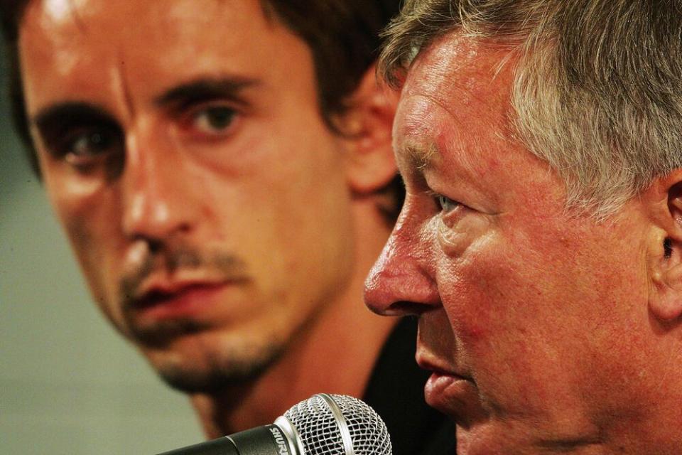 neville and sir alex ferguson attend a press conference during their 2004 usa tour