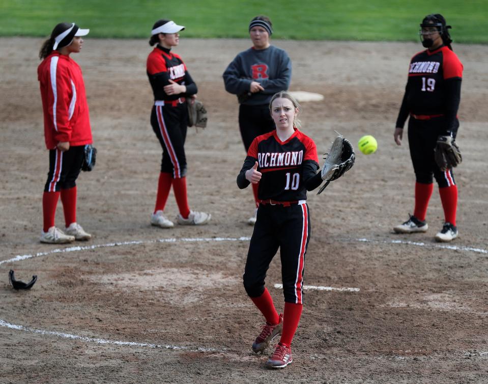 Richmond sophomore Kamdyn DePew gives the thumbs up to end her warmup pitches during a game against Hagerstown April 16, 2022.