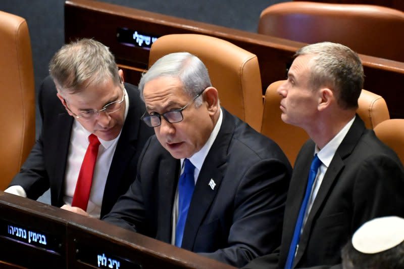 Israeli Prime Minister Benjamin Netanyahu (C) votes for the judicial overhaul bill in the Israeli Knesset in Jerusalem on Monday. Photo by Debbie Hill/UPI