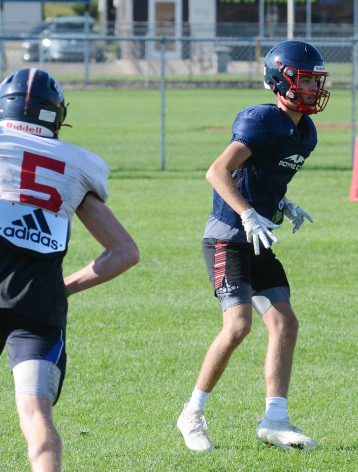 Boyne City's Mason Wilcox guards someone while keeping his eyes in the backfield during Wednesday's practice.