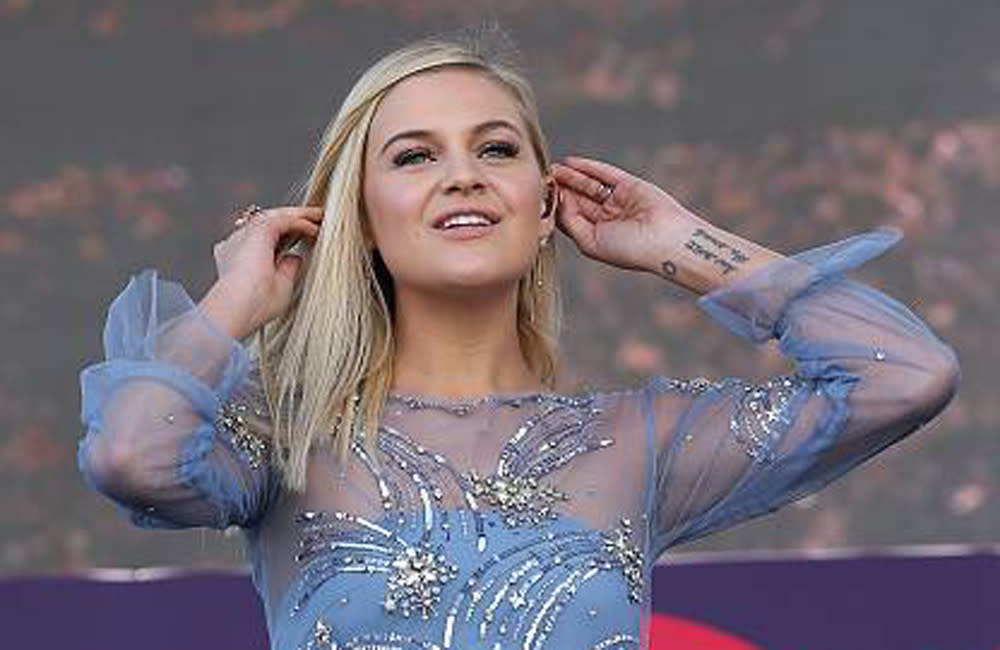 Kelsea Ballerini was forced to co-host the CMT Music Awards ceremony from home and perform from her garden after she tested positive for coronavirus credit:Bang Showbiz