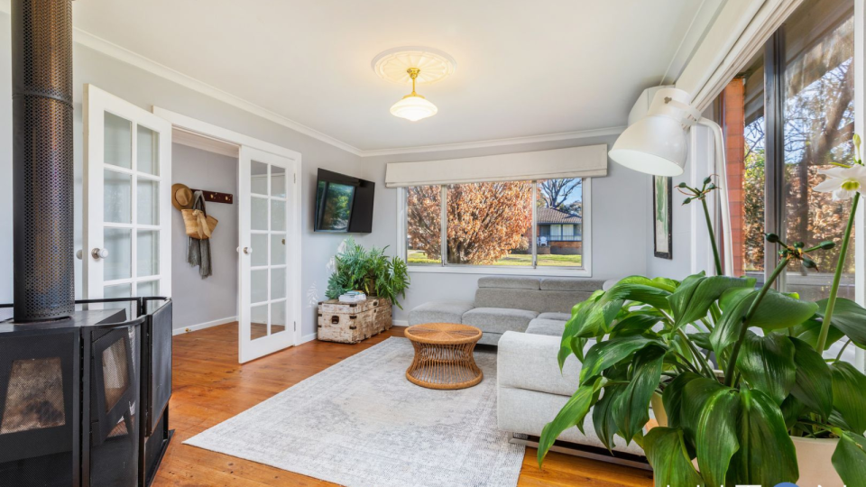 The living room of the property for sale in Canberra.