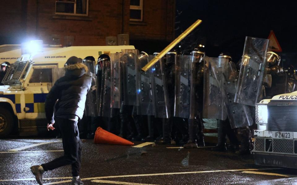 Police in riot gear had objects thrown at them by protesters - PA