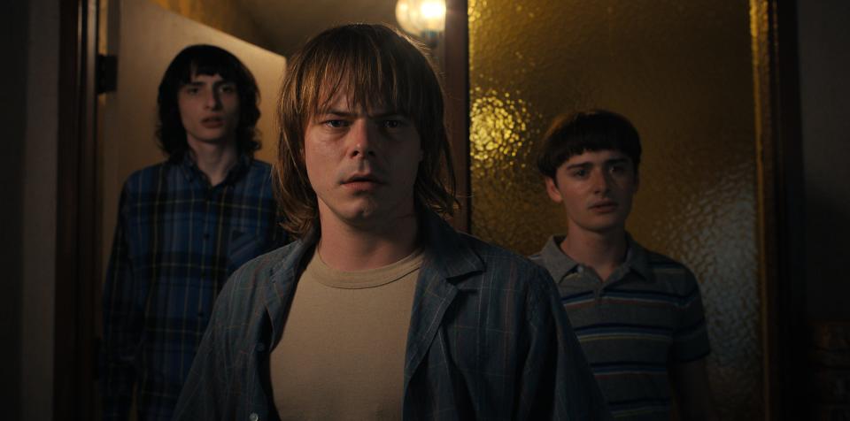 (L to R) Finn Wolfhard as Mike Wheeler, Charlie Heaton as Jonathan Byers and Noah Schnapp as Will Byers in season 4 of Stranger Things.