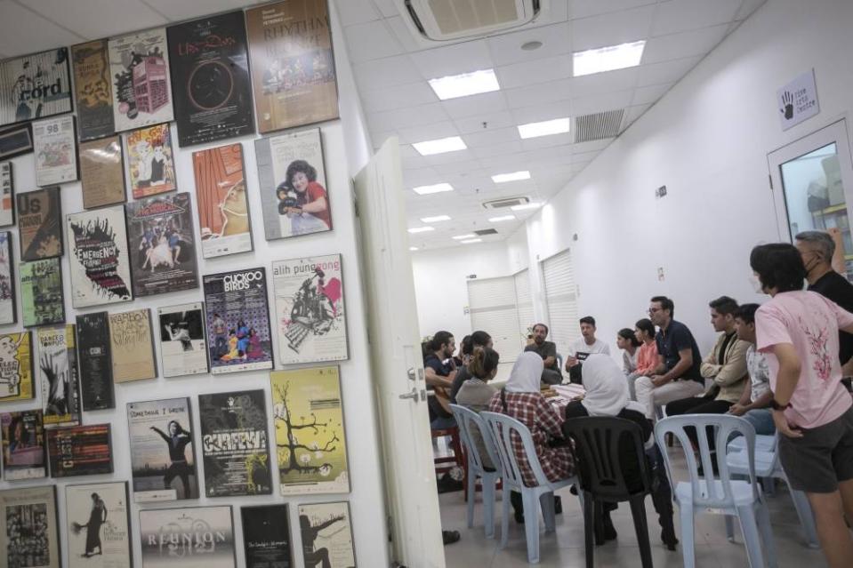 The play's cast and crew taking a break from day long rehearsals at the Five Arts Centre in GMBB, Kuala Lumpur. 