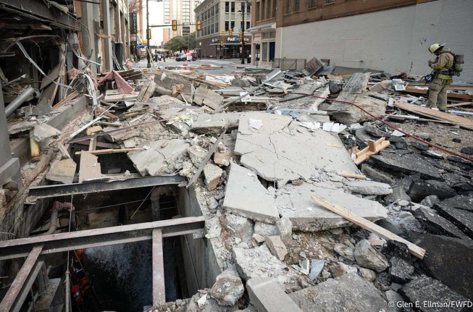 Fort Worth firefighters respond to an explosion, believed to be caused by a gas leak, at the Sandman Signature Hotel downtown on Monday, Jan. 8, 2024.