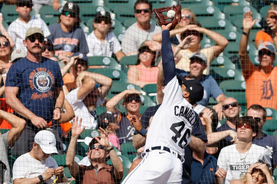 Detroit Tigers third baseman Jeimer Candelario (46) makes a catch diving into the net in the third inning against the Kansas City Royals at Comerica Park.