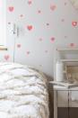 <p>A really easy way to transform bland walls is with red heart stickers, or similar. It's a great way to create an instant feature wall. These stickers can be positioned and repositioned many times, without leaving any residue behind on wall surfaces.</p><p>Pictured: Reusable Heart Wall Decals, <a href="https://www.stickers4walls.co.uk/Reusable_Valentines_Heart_Wall_Stickers/p1294546_20955380.aspx" rel="nofollow noopener" target="_blank" data-ylk="slk:Stickers4Walls;elm:context_link;itc:0;sec:content-canvas" class="link ">Stickers4Walls</a></p>