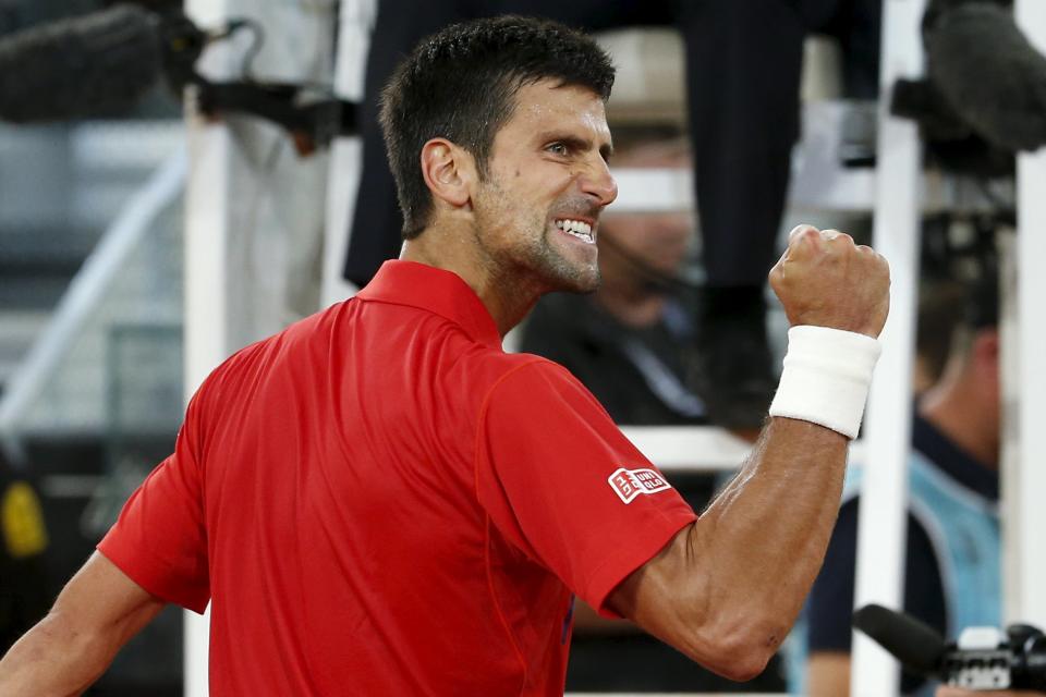 Tennis - Madrid Open - Novak Djokovic of Serbia v Milos Raonic of Canada - Madrid, Spain - 6/5/16. Djokovic celebrates his victory. REUTERS/Sergio Perez