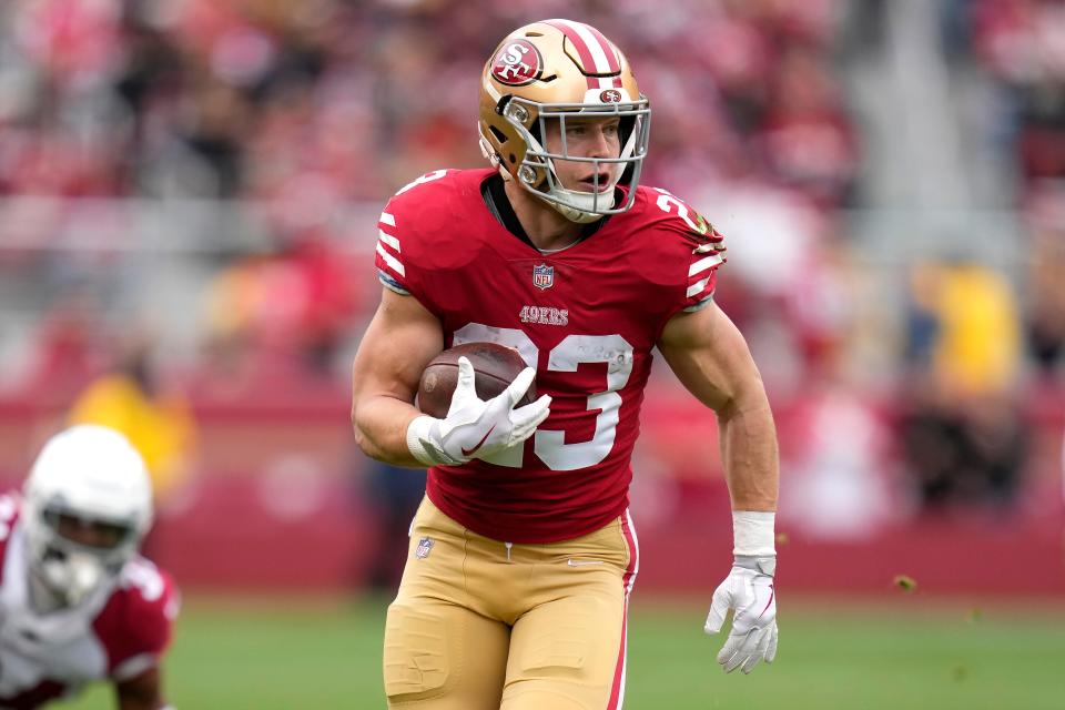 San Francisco 49ers running back Christian McCaffrey (23) runs toward the end zone to score against the Arizona Cardinals during the first half of an NFL football game in Santa Clara, Calif., Sunday, Jan. 8, 2023. (AP Photo/Godofredo A. Vásquez)