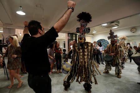 Refugees from Africa perform during an awareness arts show on refugees in Hong Kong June 16, 2016. REUTERS/Bobby Yip