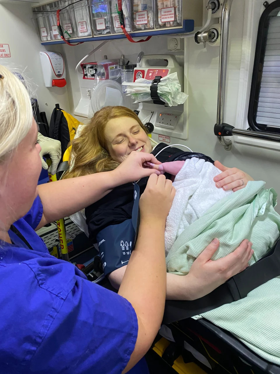 Moore with newborn Millie-Rose in the ambulance. (Getty Images)