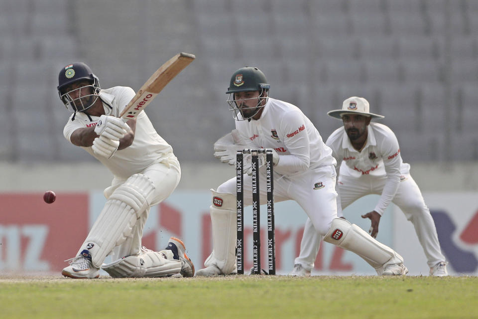 India's Ravichandran Ashwin plays a shot during the four day of the second cricket test match between Bangladesh and India, in Dhaka, Bangladesh, Sunday, Dec. 25, 2022. (AP Photo/Surjeet Yadav)