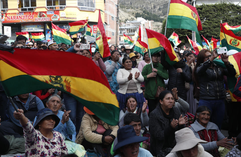 Anti-government protesters against the reelection of President Evo Morales, attend a rally with the coca leaf growers in La Paz, Bolivia, Thursday, Nov. 7, 2019. The United Nations on Thursday urged Bolivia's government and opposition to restore "dialogue and peace" after a third person was killed in street clashes that erupted after a disputed presidential election on Oct. 20. (AP Photo/Juan Karita)