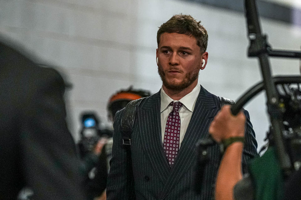 Texas quarterback Quinn Ewers arrives at the Superdome on Jan. 1 ahead of the College Football Playoff semifinal game at the Sugar Bowl. The Longhorns were eliminated by Washington that night. About 10 days later, Ewers announced he would return to Texas for 2024.