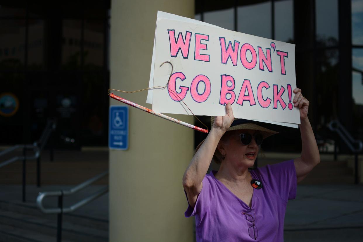 An abortion rights supporter participates in a rally at the Manatee County administration building last summer.