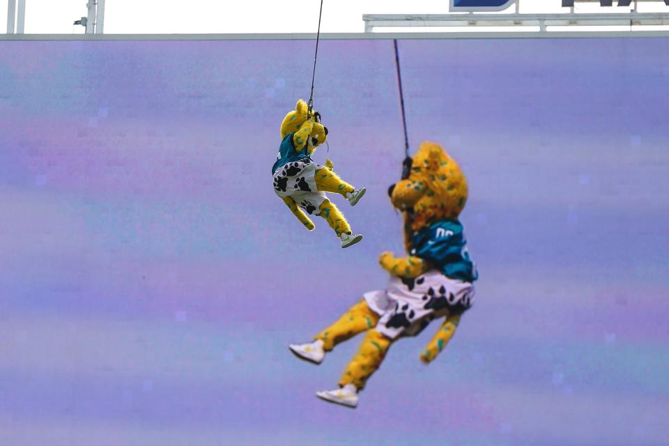 Jacksonville Jaguars mascot Jaxson de Ville attempts a bungee jump above the stadium.