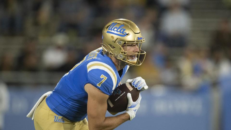 UCLA running back Colson Yankoff runs with the ball against Coastal Carolina.