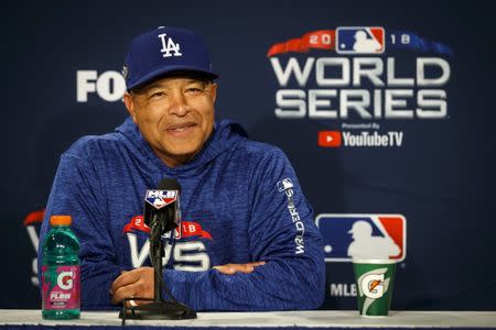 Oct 22, 2018; Boston, MA, USA; Los Angeles Dodgers manager Dave Roberts (30) speaks to reporters during media day one day prior to the 2018 World Series at Fenway Park. Mandatory Credit: David Butler II-USA TODAY Sports