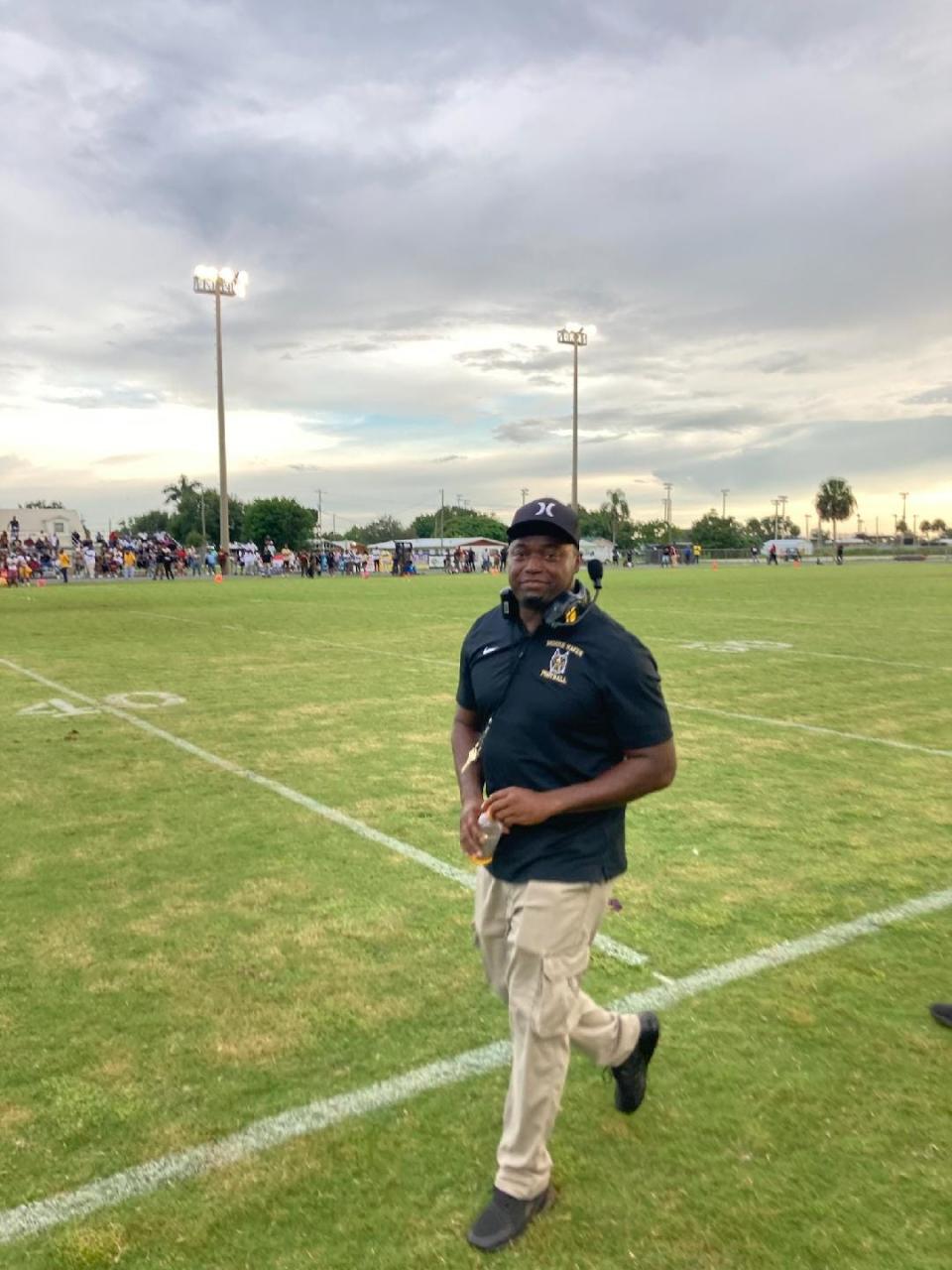 Former Pahokee football head coach Emmanuel Hendrix leads his players as defensive coordinator for Moore Haven during a preseason Kickoff Classic game against Glades Central on Aug. 18, 2023 in Moore Haven.