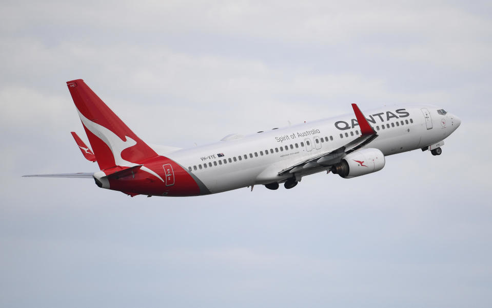  A Qantas Boeing 737-800 aircraft takes off at Sydney's Kingsford Smith Airport on November 16.  / Credit: / Getty Images