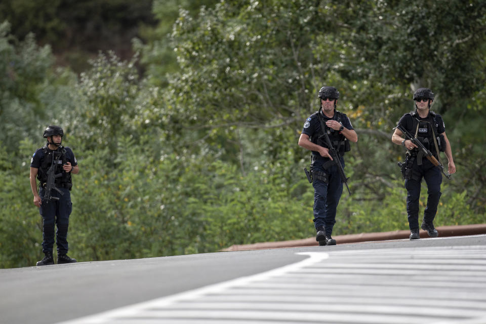 Kosovo police officers secure a cross road leading to the Banjska Monastery in the village of Banjska on Sunday, Sep.t24, 2023. Kosovo's prime minister on Sunday said one police officer was killed and another wounded in an attack he blamed on support from neighboring Serbia, increasing tensions between the two former war foes at a delicate moment in their European Union-facilitated dialogue to normalize ties. (AP Photo/Visar Kryeziu)