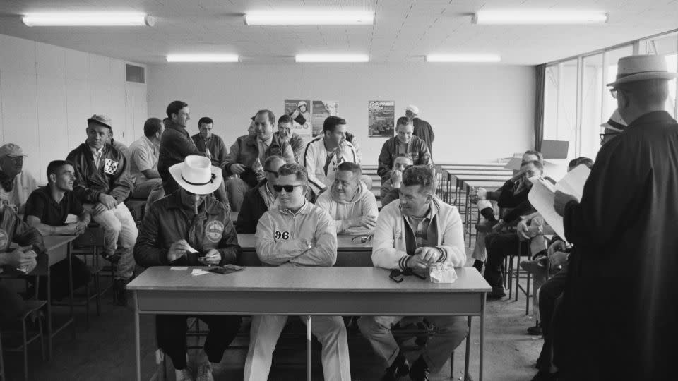 With a sixth sense for where the action would be, Honda snuck into a pre-race briefing, capturing a candid shot of drivers - shots of rare access and intimacy that now would be impossible due to stricter regulations at the paddock. - Joe Honda Archive