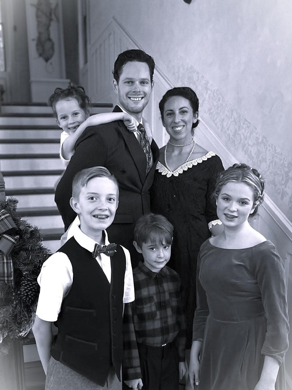 The Baileys sing their story in "It's A Wonderful Life -- the Musical." Bottom, l to r, are Beckham Peterson as Pete, PJ Berube as Tommy, Merritt Willcox as Janie. Standing are Paul RIchardson as George, Meghan Richardson as Mary and Millie Richardson as baby Zuzu.