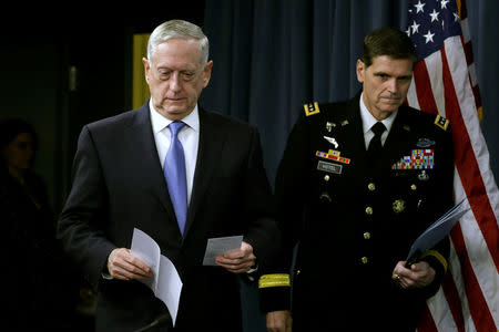 U.S. Defense Secretary James Mattis (L) and Army Gen. Joseph Votel, commander of U.S. Central Command, arrive to brief the media at the Pentagon in Washington, U.S., April 11, 2017. REUTERS/Yuri Gripas