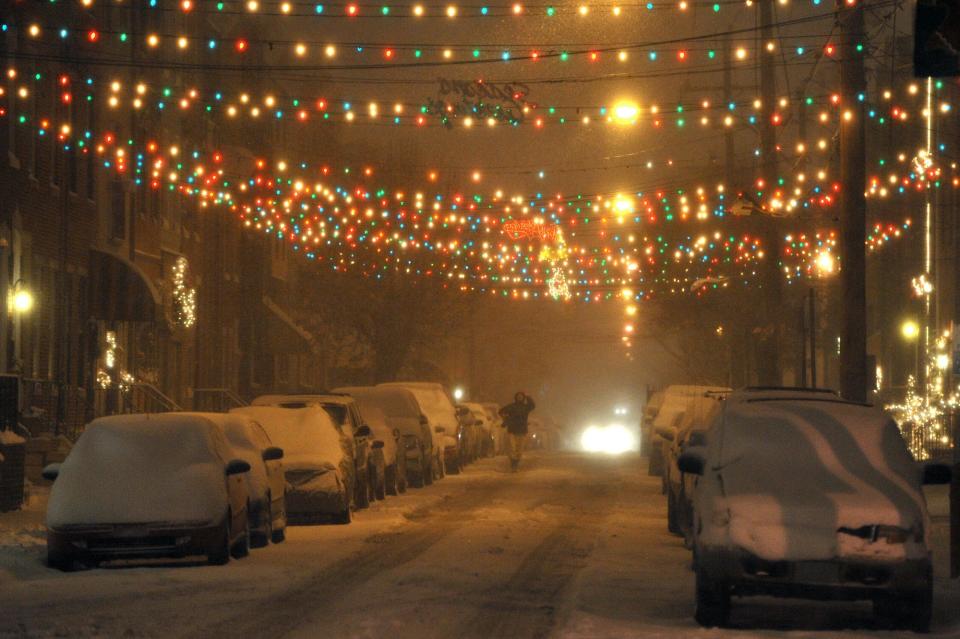 A person walks down the street during a blizzard on December 26, 2010 in Philadelphia, Pennsylvania.