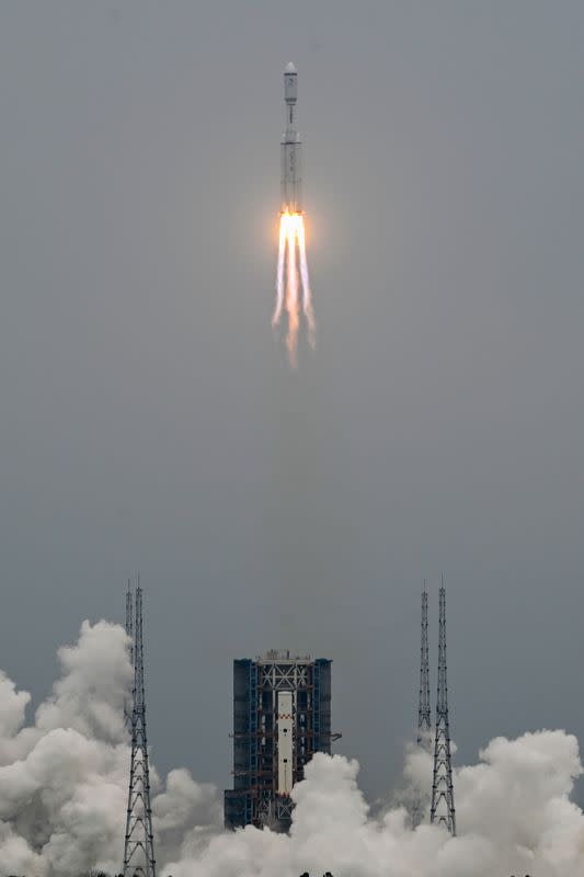 Long March-8 rocket, carrying the relay satellite Queqiao-2 for Earth-Moon communications, blasts off in Hainan