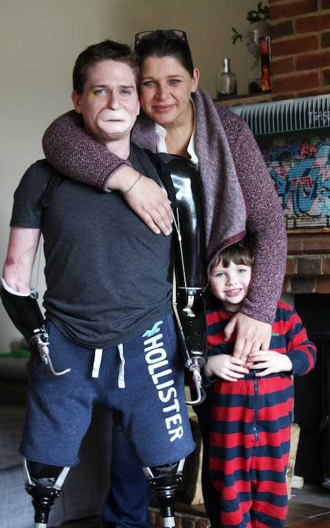 Alex Lewis with his partner Lucy and their son Sam pictured back in 2014. - Credit: Daily Echo/Solent News & Photo Agency