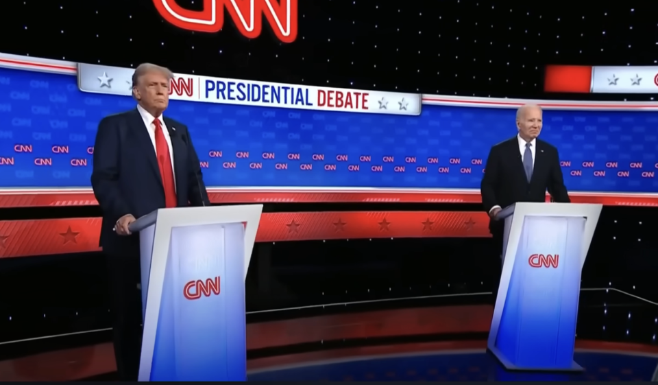 Donald Trump and Joe Biden standing at podiums during a CNN Presidential Debate