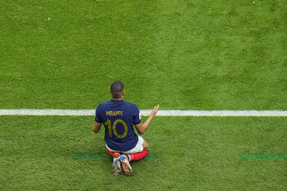 France's Kylian Mbappe reacts during the World Cup quarterfinal soccer match between England and France, at the Al Bayt Stadium in Al Khor, Qatar, Saturday, Dec. 10, 2022. (AP Photo/Hassan Ammar)