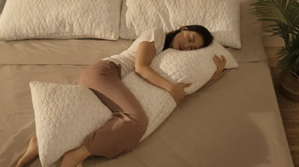 Body pillows can offer relief in a pinch no matter what position you sleep in.