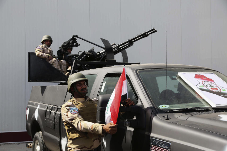 Weaponry is on display at a weapons exhibition organized by the Iraqi defense ministry at the Baghdad International Fairgrounds in Baghdad, Iraq, Saturday, March 1, 2014. Companies from Japan, U.S., Germany, Egypt, China and others displayed armored vehicles, sample models of aircraft and light and medium weaponry. (Karim Kadim)