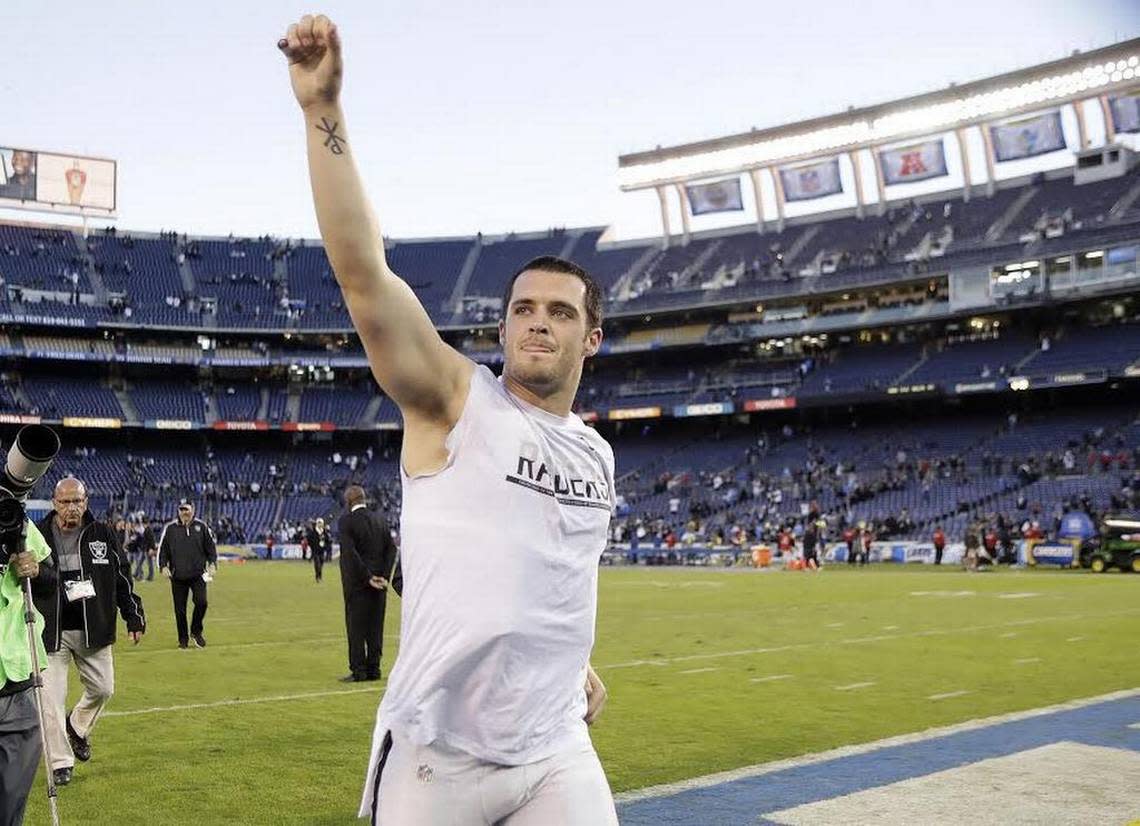Derek Carr runs off the field after defeating the Chargers on Sunday, Dec. 18, 2016, in San Diego.