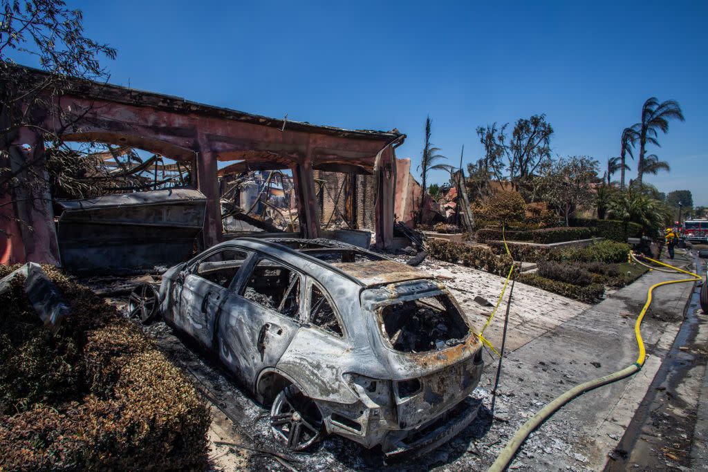 A home and SUV burned down in California