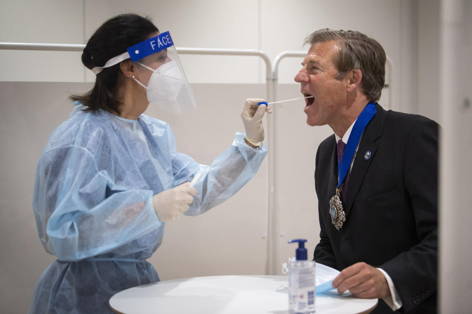 Lord Mayor of London William Russell is tested for coronavirus alongside staff from Legal and General ahead of returning to their Head Office in London.