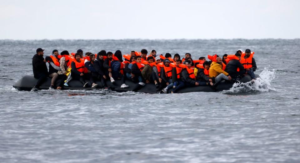 A dinghy overloaded with migrants pictured on Tuesday morning (STEVE FINN PHOTOGRAPHY for dailymail.co.uk)