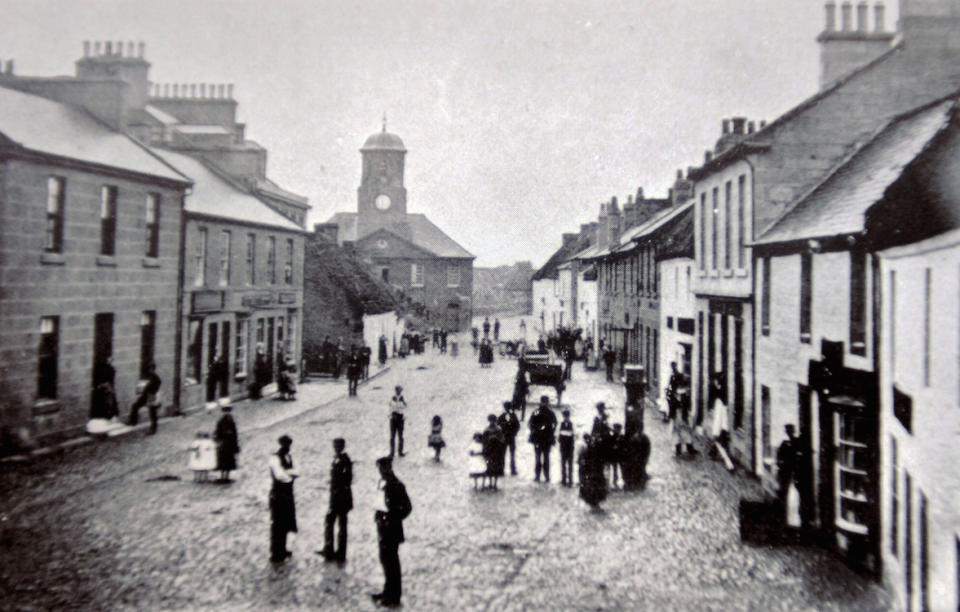 The oldest post office in the world in Sanquhar, Scotland - on the right- pictured in 1860 (Picture: SWNS)